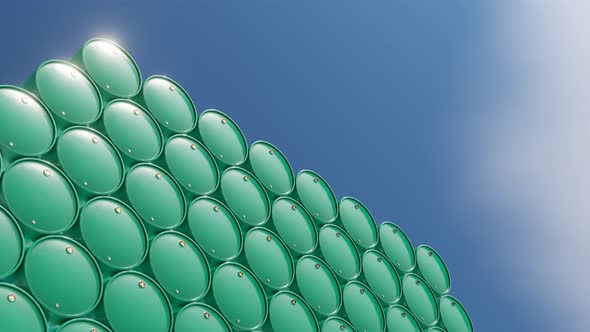 Pile of oil barrel chemical tanks with sky background