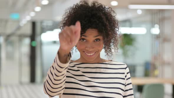 Assertive African Woman with Pointing with Finger