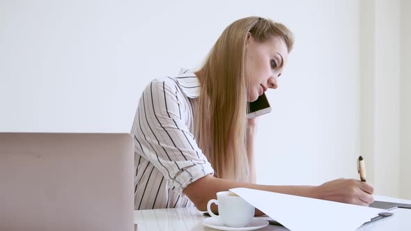 Blonde Business Woman Working at Modern Office