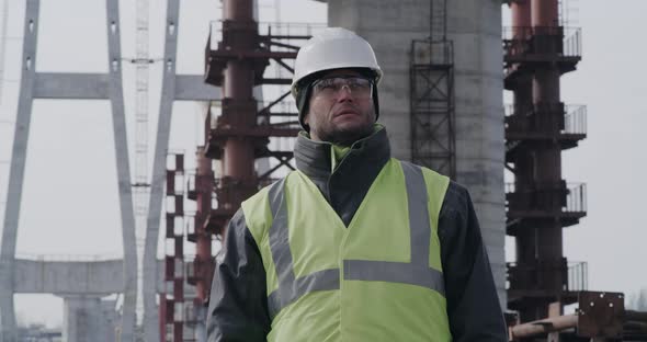 Male Contractor on Bridge Construction Site