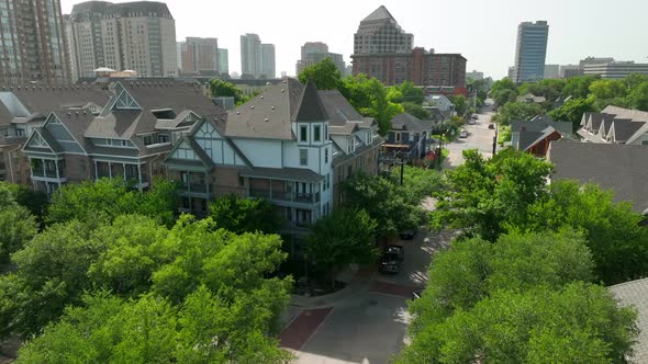 Homes in downtown city in Texas USA. Aerial reveal.