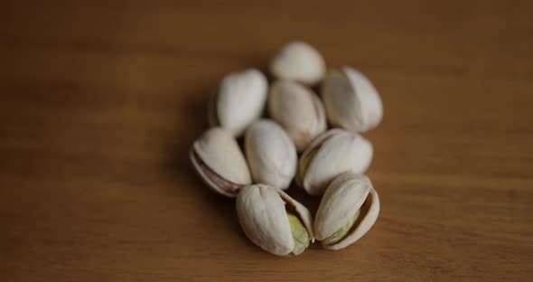 Close Up Pan Right of Pistachios on a Table