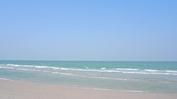 Beautiful tropical beach sea ocean with blue sky and white cloud