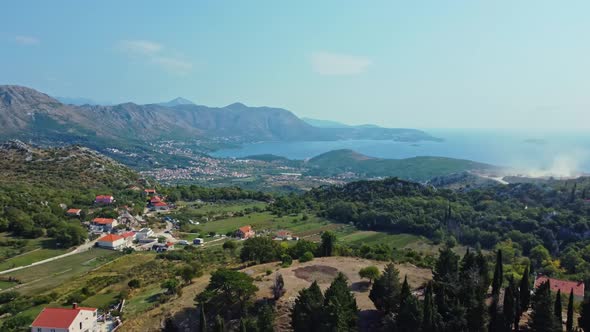 Aerial shot overlooking Dubrovnik harbour and the Adriatic Sea in Croatia