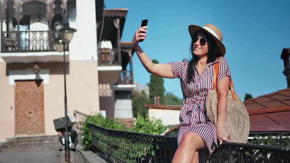 Joyful Young Tourist Woman Posing Taking Selfie Use Smartphone