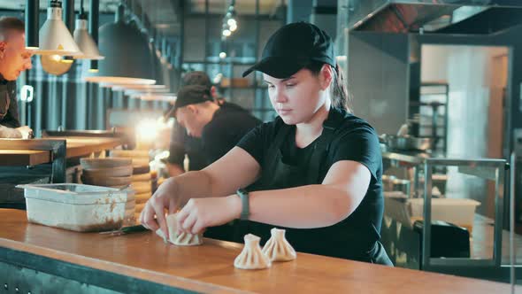 Restaurant Worker is Shaping a Dumpling