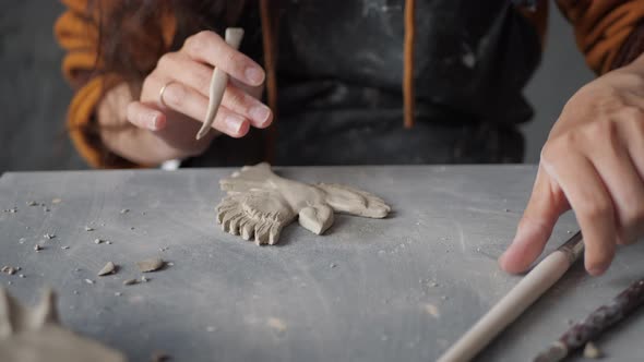 Talented Artist Work with Different Pottery Tools