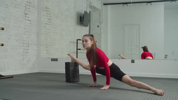 Active Fitness Female Performing Straddle Splits