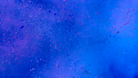 Colored particles fly after being exploded, Slow Motion