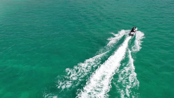 AH - Jetski in Tropical Ocean and Beautiful Island 02