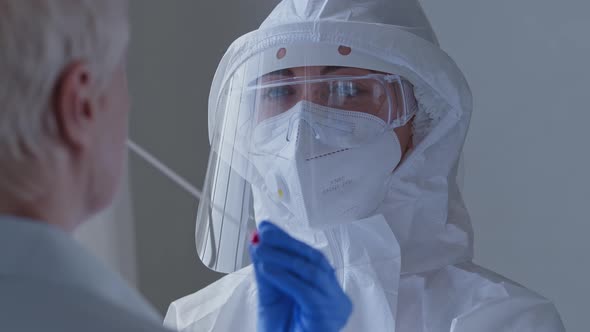 Portrait of Woman Doctor Scientist Nurse Medic in Special Uniform Transparent Protective Face Shield