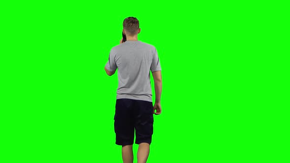 Guy Goes and Talks on the Phone, Chroma Key. Back View