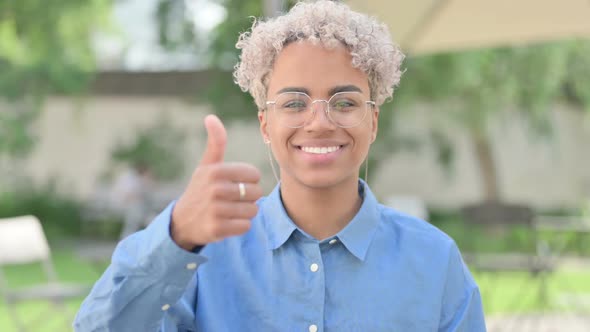 Portrait of Young African Woman Showing Thumbs Up Sign