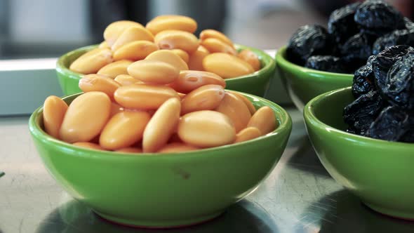 Yellow Beans and Dried Plums in Small Bowls - Restaurant