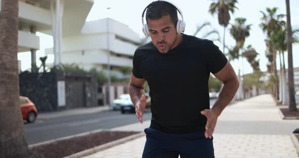 Man doing workout routine outdoor - Sport, workout and healthy lifestyle concept