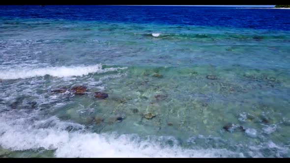 Aerial above nature of marine sea view beach vacation by blue ocean with white sandy background of a