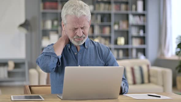 Old Man Having Neck Pain at Work