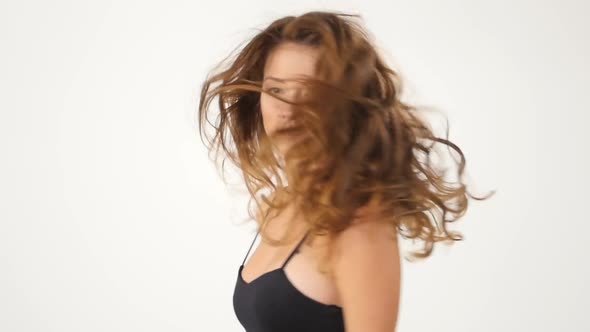Sexy Girl Isolated on a White Background. Hot Brunette. Slow Motion.
