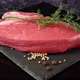 tenderloin veal meat for steaks fillet mignon with spices and greens on black board. - VideoHive Item for Sale