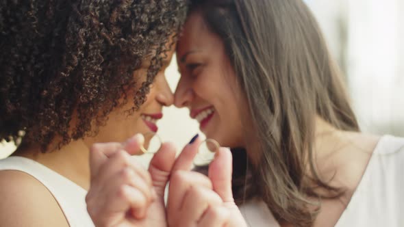 Closeup of Kissing Lesbian Brides