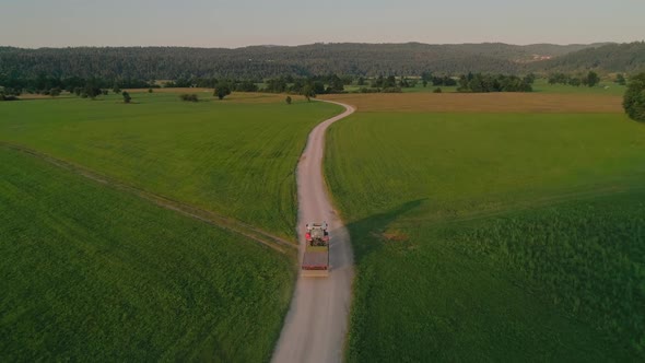 Tractor Returns To Farm After Agriculture Work Day