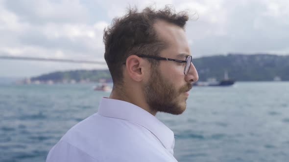 Thoughtful man watching the sea.