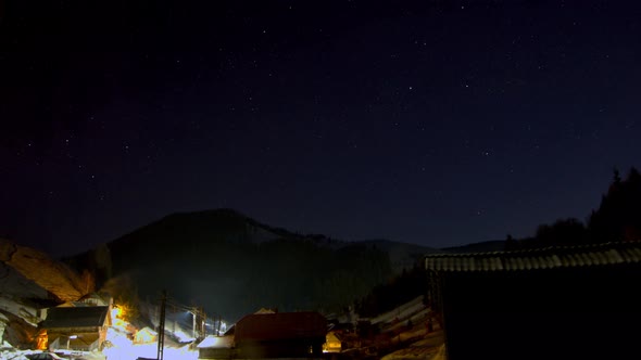 Night Starry Sky Over Mountain Village