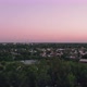 Aerial flight over urban area with parks, houses and trees. - VideoHive Item for Sale