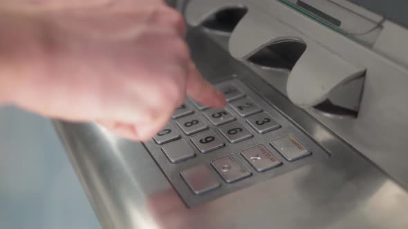 Atm Machine Close Up Hand Entering Pin Number Bank Credit Card. Close Up of the Hand of Woman