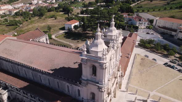 Tilt down shot, facade details of famous gothic monument Monastery of Alcobaca, Leiria Portugal.