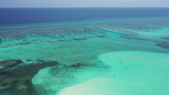 Luxury overhead travel shot of a summer white paradise sand beach and turquoise sea background