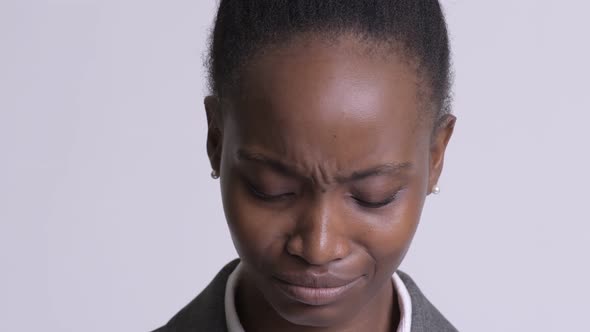 Face of Young Sad African Businesswoman Depressed and Crying
