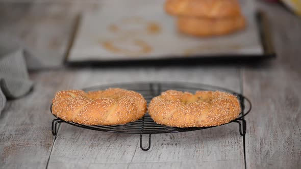 Fresh Tasty Turkish Simit on Cooling Rack