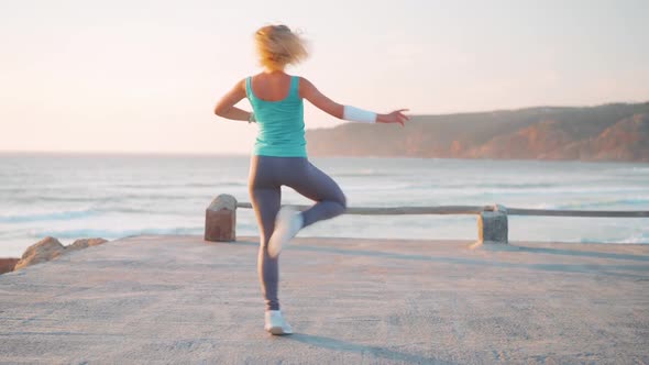 Female Student of Dance School Engaged Outdoor Activities Ocean Seaside Background in Sports Uniform