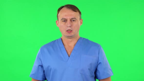 Medical Man Refuses Stress and Takes Situation, Calms Down, Breathes Deeply, Green Screen