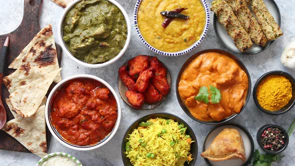 Assorted Indian Various Food with Spices Rice and Fresh Vegetables