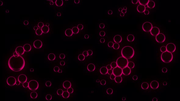 Oil pink drops moving in water