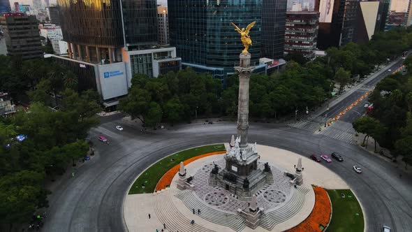 Aerial footage of Angel of independence in Mexico city on reforma avenue, cempasuchil flowers of the