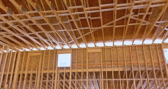 Insaide View of Framing Beams Stick Built New Home Under Construction