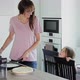 Mother and Daughter Cooking in Kitchen - VideoHive Item for Sale