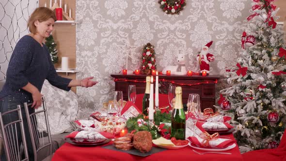 Big Family Sitting Around the Table To Celebrate Christmas