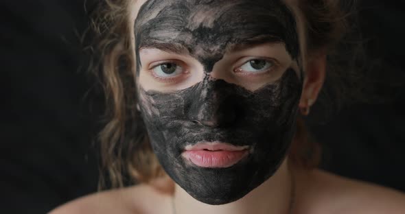 Girl with a Care Mask on Her Face