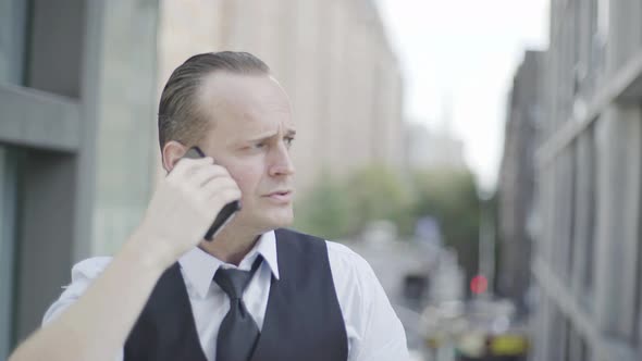 Businessman talking on cell phone