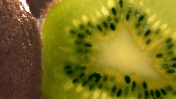 Rolling Half of Kiwi and Opening the Inside of the Fruit in Slow Motion