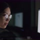 Candid of Asian businesswoman staying late hours in the home office. - VideoHive Item for Sale