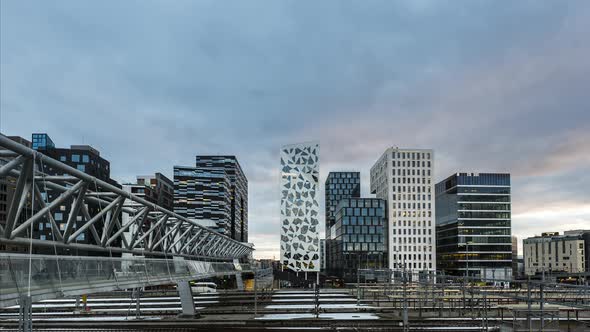 Acrobat Bridge Across The Tracks Of Oslo Central Station With Bjorvika District In Background At Dus