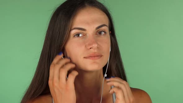 Young Woman Enjoying Listening To Music on Chromakey 1080p