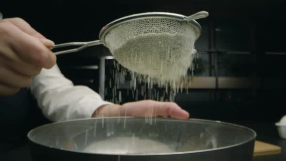 Sifting Flour in the Restaurant Kitchen