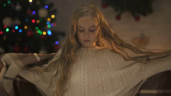 Abandoned Girl With Plaid Looking to Camera Waiting New Family, X-Mas Time