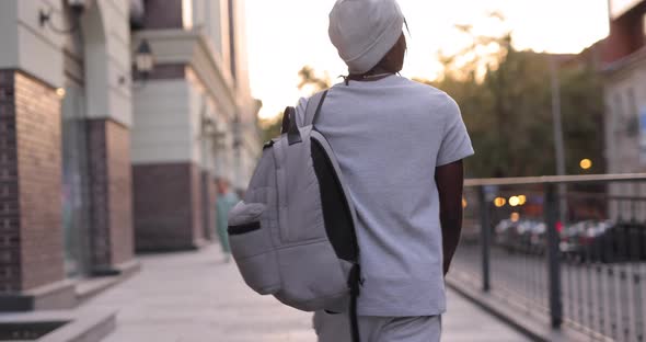 African American Man Walking in a City Street Slow Motion